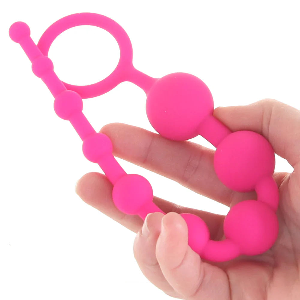 All About Anal Seamless Anal Beads in Pink – Heaven Boutique Toronto – side view